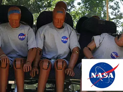 Three crash test dummies with NASA logo on shirts 