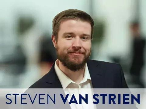 Headshot of Steven Van Strien with office background