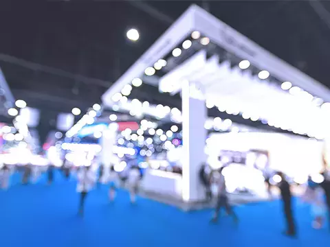 Exhibitor booths at a tradeshow
