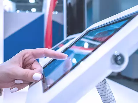 Woman registereing for event on tablet