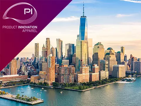 PI Apparel logo over cityscape of New York City