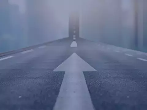 Road with arrow pointing to future