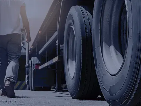 Person walking next to a truck