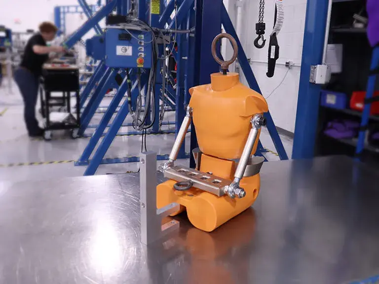 A FAD 2 crash test dummy in a test lab