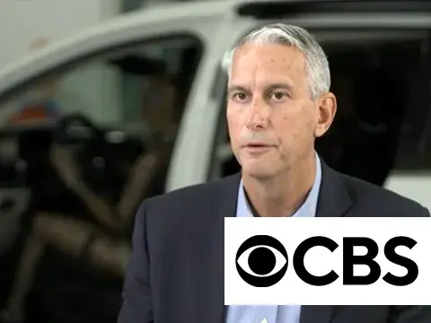 Christopher O'Connor being interviewed by CBS
